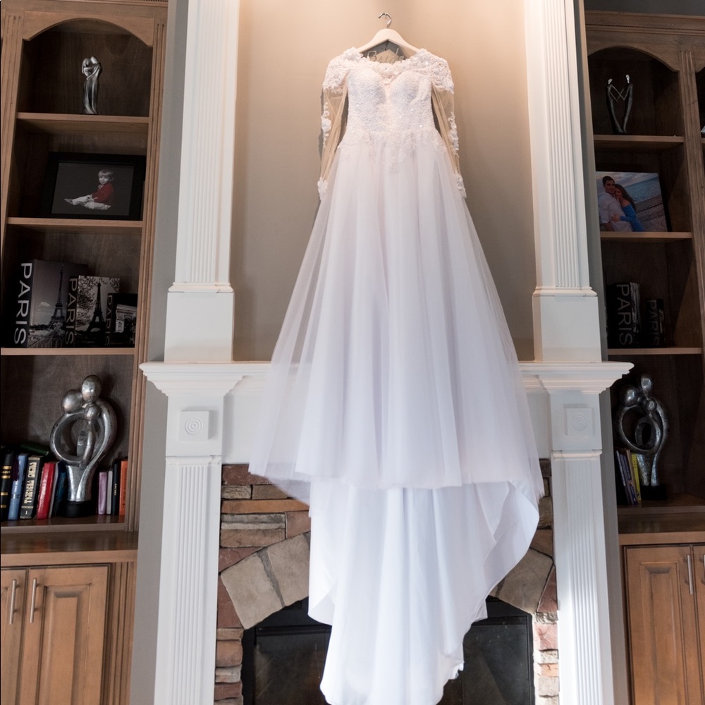 Sell my wedding dress made in Europe!